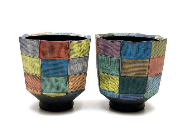 Doug Peltzman’s two yunomis, 3¾ in. (10 cm) in diameter, wheel-thrown porcelain, fired to cone 8.