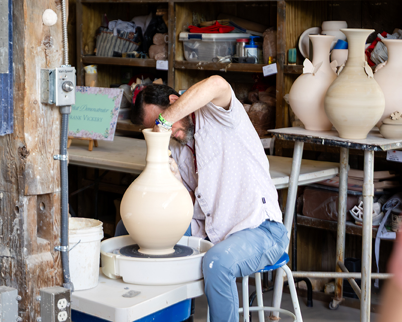 Image of Frank Vickery, Director of Ceramics at the Bascom throwing on the pottery wheel
