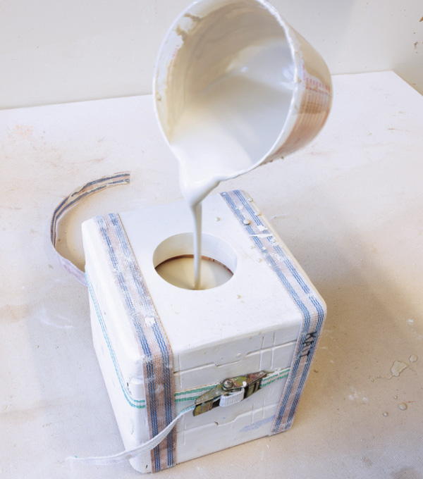 5 Pour casting slip into the mold and let the walls thicken, then dump the slip and leave the cast walls to stiffen in the mold.