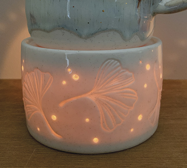 12 Once the form is fired, light a tea candle, insert it, and place a hot or warm beverage on top to enjoy at your leisure.