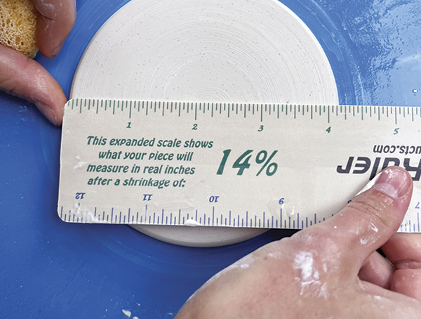 C Finally, carefully turn the piece over without squishing it, and measure the base from edge to edge.