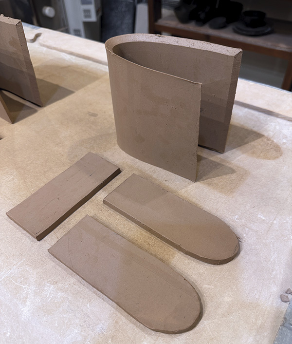 2 Lay out all of the components for one vase to slightly set up the form before beginning construction.