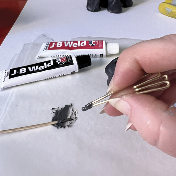 7 Apply epoxy to the two cut ends of the wire using a toothpick.