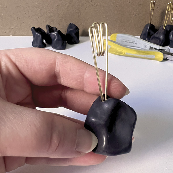 9 Once fully cured, assess and adjust the prongs as needed.