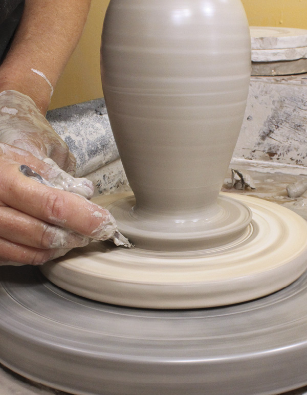 7 Trim away excess clay to leave a clean undercut. Wire and remove the form.