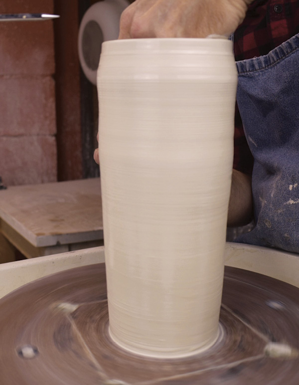 2 Finish the pull with the cylinder slightly taller than the completed size.