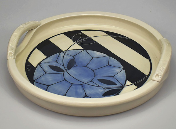 Alex Pratt's Striped tray with handles, 11 in. (27.9 cm) in diameter, cone-6 porcelain, sgraffito, terra sigillata, fired in oxidation to cone 6, 2025.