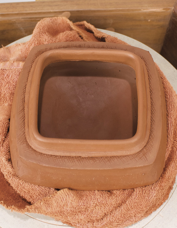12 Fit flange to the box’s lid prior to scoring and attaching.