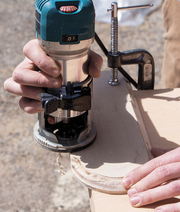 2 Rout the edges with a 45° chamfer router bit. Sand the sharp edges.