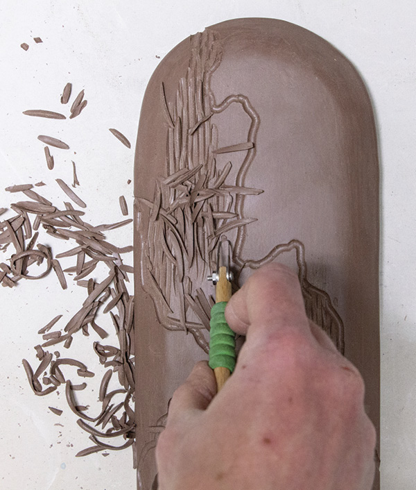 13 Carve your own inspired texture into the leather-hard clay.