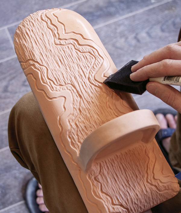 15 Wax the surfaces that you want to remain unglazed.