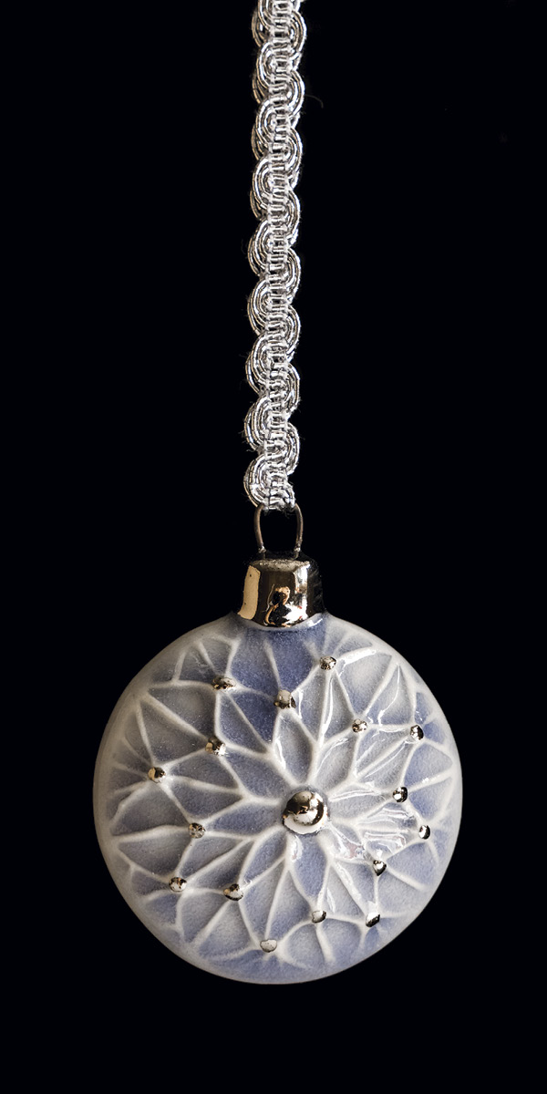 Holiday ornament, to 3 in. (7.5 cm) in height, Plainsman M-370 clay, slab built, fired to cone 6 in oxidation, 2023. Photo: Sara Kempner.