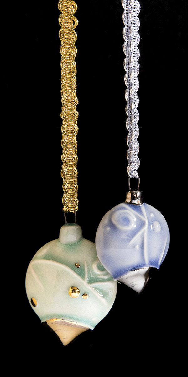 Holiday ornaments, to 3 in. (7.5 cm) in height, Plainsman M-370 clay, slab built, fired to cone 6 in oxidation, 2023. Photo: Sara Kempner.
