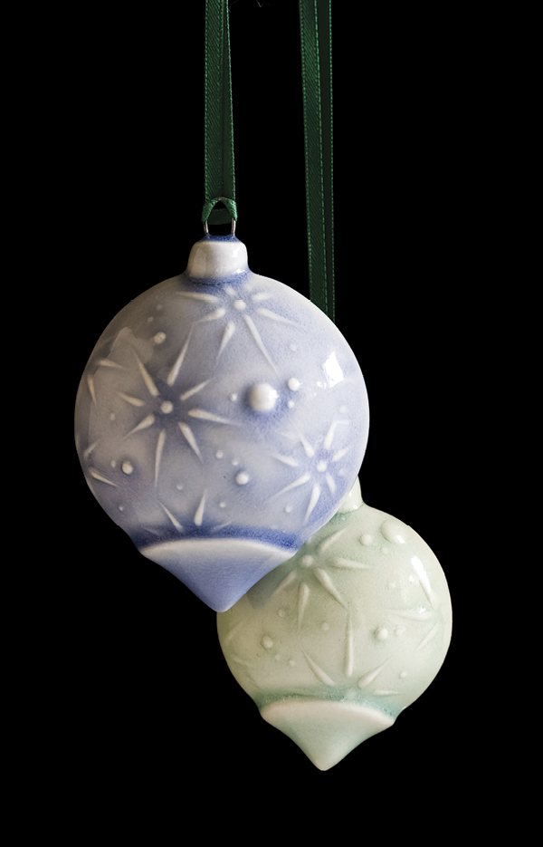 Holiday ornaments, to 3 in. (7.5 cm) in height, Plainsman M-370 clay, slab built, fired to cone 6 in oxidation, 2023. Photo: Sara Kempner.