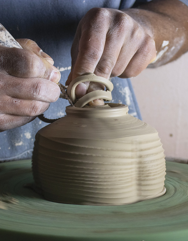 12 Carve the inside of foot, and then refine the ring and bottom.