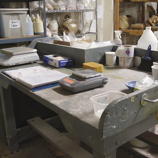 6 Set up a work bench for testing glazes and holding testing equipment.