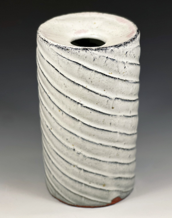 Erik Wilson’s drop-rim vase with spiral pattern, 7 in. (18 cm) in height, porcelaneous stoneware, Nuka glaze, fired to cone 10 in gas reduction, 2023.