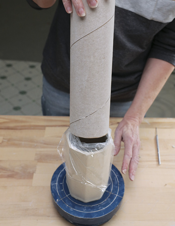 13 Remove the carpet tube by sliding it out of the plastic.