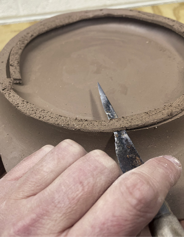 5 Using a sharp knife and steady hand, cut the top of the foot coil level.