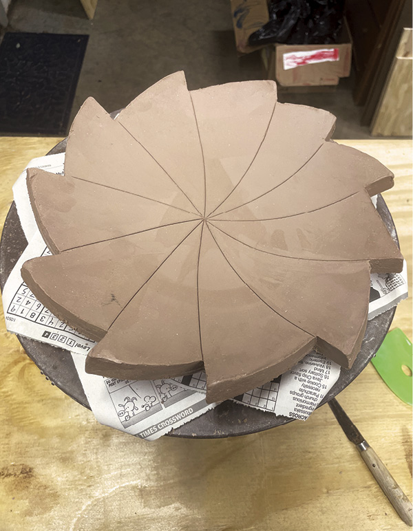 7 Rough out sections by drawing from a central radiating point.