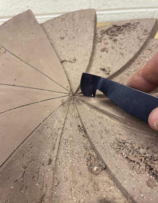 10 Use sharper, open blades and tools to define the tighter central space.