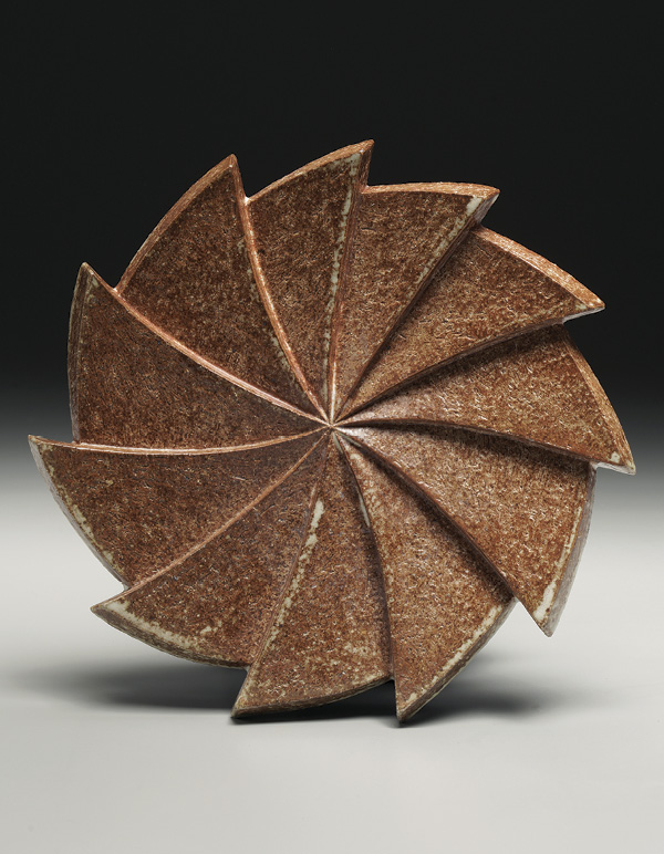 15 Will Dickert's Carved Plate, Cog Design, fired in a wood kiln, 2024. Photo: Tim Barnwell.