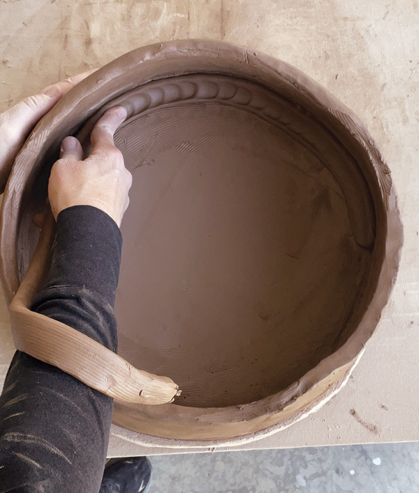 8 Add a thick coil to the interior seam to strengthen the seam and create a nice curve from wall to floor.