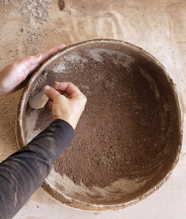 13 Same for the interior. Move the piece around, scraping in a way that rips texture into the surface.