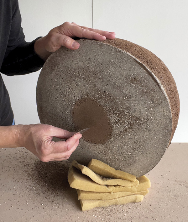 15 After the piece is mostly dry, scrape a concave foot on the base to allow the vessel to sit level.