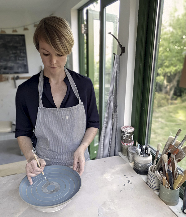 Hida Carr working in her studio.