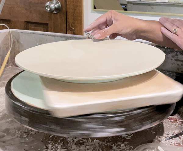 9 Re-center on the wheel and, slowly and carefully, trim the ragged edge with a rasp.