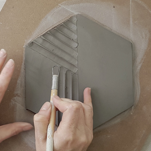 Geometric Carved Tile by Hilda Carr article thumbnanil