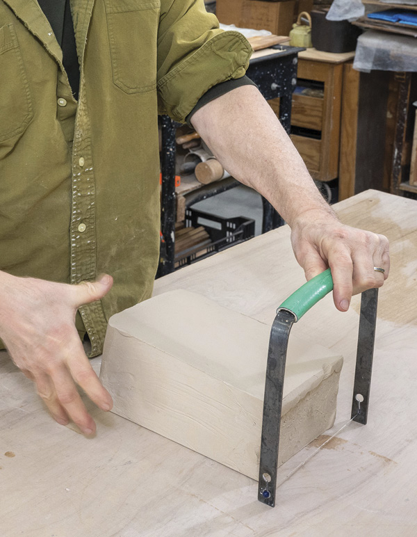 1 Start by cutting ½-inch-thick slabs from a block of white stoneware.