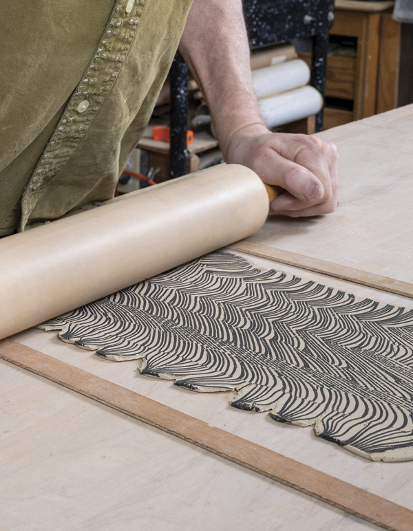 12 Using thickness strips to maintain consistency, use a rolling pin to compress.