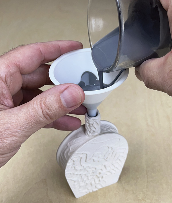 19 After bisque firing, use a funnel to glaze the interior with a watered-down food-safe glaze.