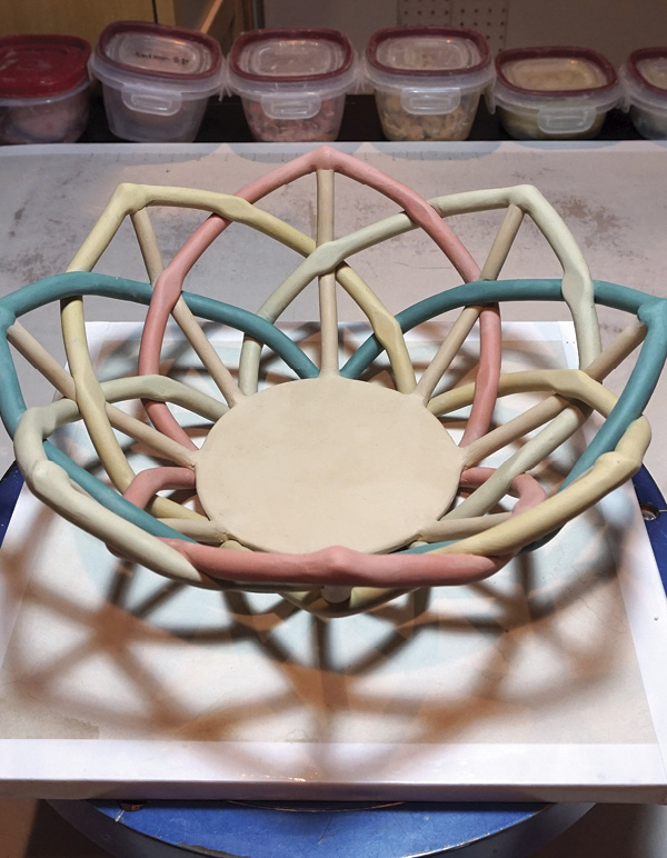 14 Slowly dry the basket on drywall and cover with plastic.