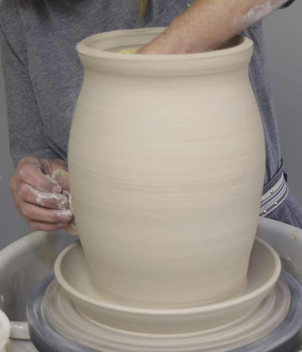 13 Finish the rim and trim around the base of the saucer with a wood or metal tool.