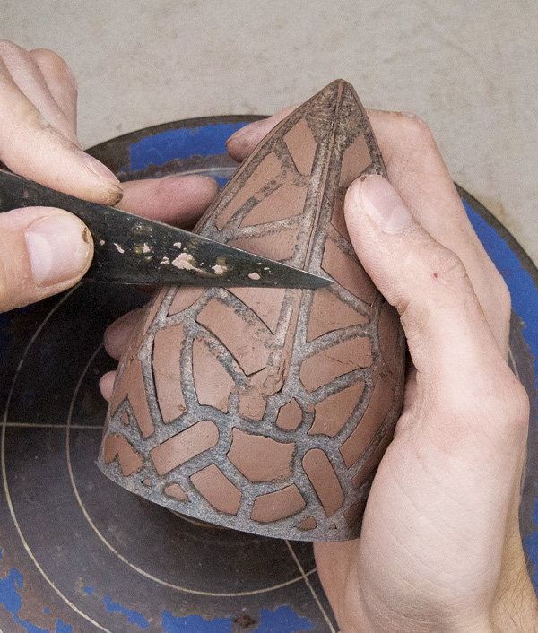 8 Compress the exterior of the seams with a straight-edged tool, and the interior with a pointed silicone nib.