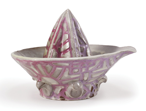 16 The complete reamer set fired to cone 6 in oxidation. The tin-opacified glaze and chrome glaze create pink tones when fired together.