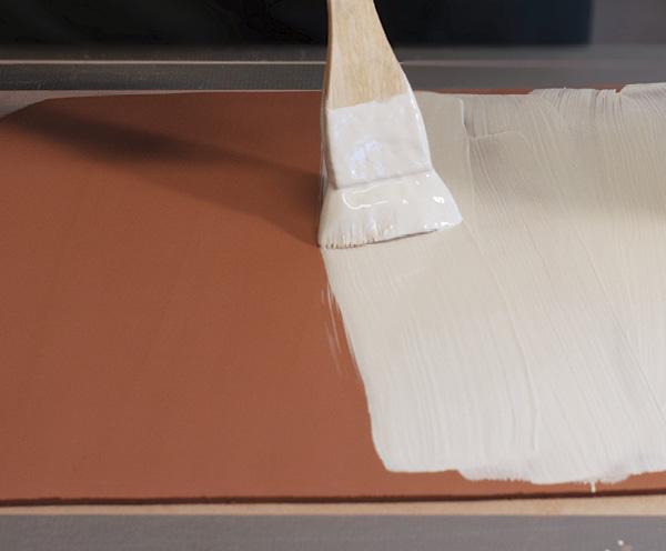 3 With a soft brush apply two layers of slip, letting it become leather hard (dry to a satin sheen) after each application.