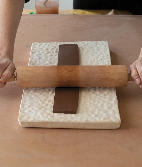 9 Add texture to the slab that will form the lid wall. I like to use a textured plaster slab for efficiency.