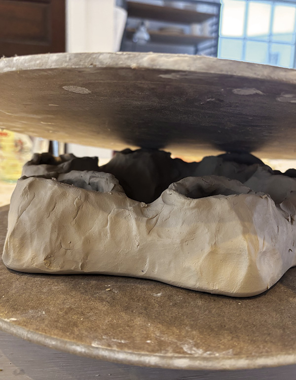 4 Once roughed out, sandwich ring between two bats and flip over.