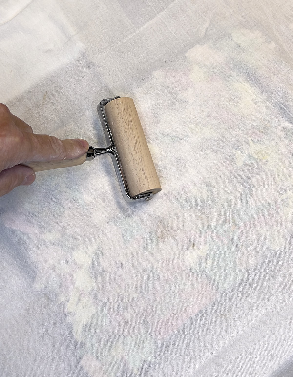 5 Apply a cotton towel and gently roll over to attach the slips to the slab.