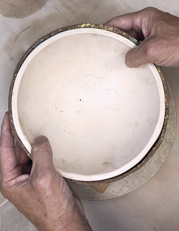 13 Flip the mold and allow it to gently fall off the mold onto a ware board.