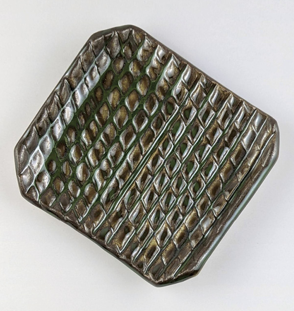 Jennifer España's Trinket plate, textured with a bisque roller, commercial glazes, fired in oxidation to cone 6.
