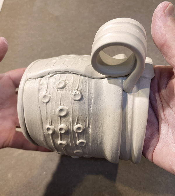 B4 Add the circular section by scoring and slipping it to attach to the cup.