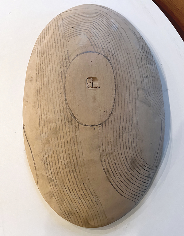 5 Completed design on interior of the form in pencil.