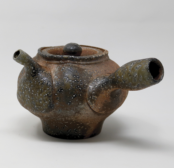Teapot, 7 in. (18 cm) in height, 2023. High-alumina porcelaneous stoneware, soda fired to cone 10 in reduction, reduction cooled to 1666°F (908°C).
