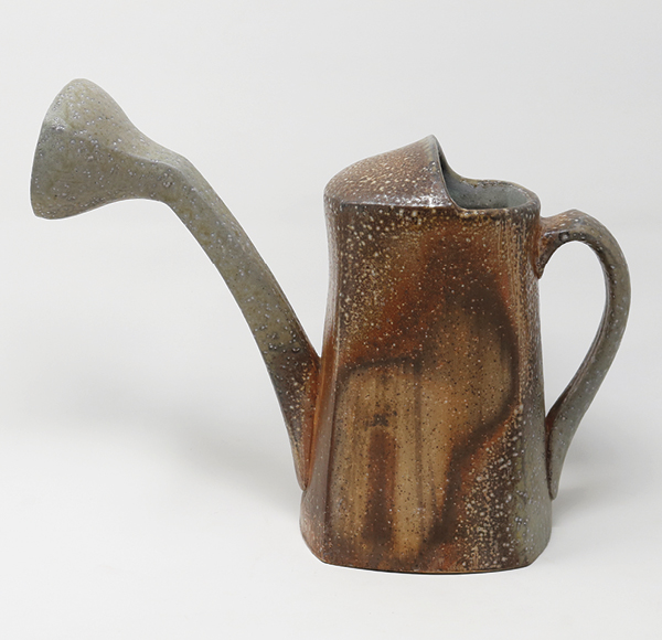 Watering can, 10 in. (25 cm) in height. High-alumina porcelaneous stoneware, soda fired to cone 10 in reduction, reduction cooled to 1666°F (908°C), 2023.