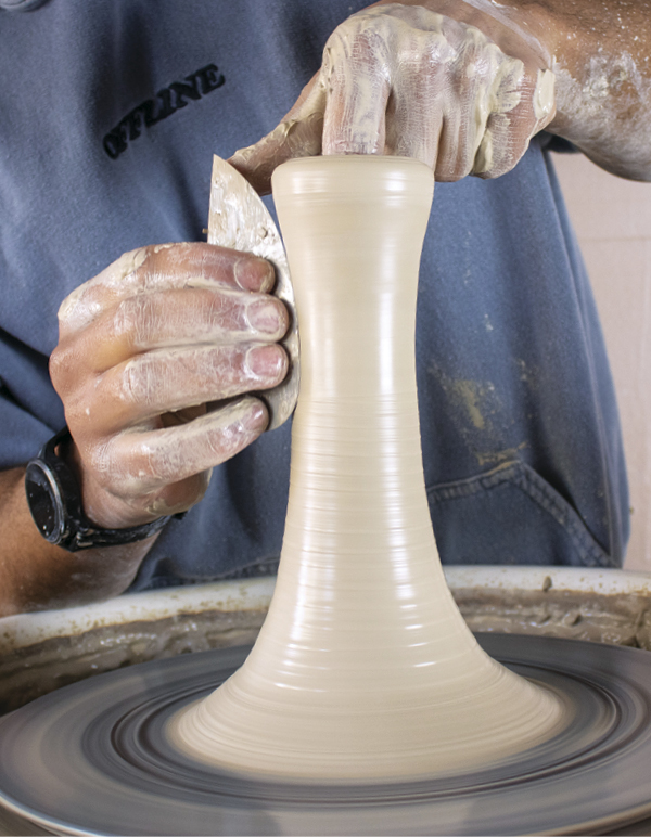 1 Throw the chalice stem into a skinny cylinder with walls about ½ inch thick.